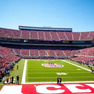 Fans cheering at an SDSU football game