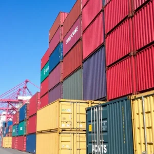 Busy California port with shipping containers and cargo ships